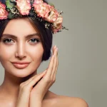 spa-beauty-cute-woman-spa-model-with-healthy-skin-sweet-flowers-beautiful-girl-smiling-background-with-copy-space_221436-2540